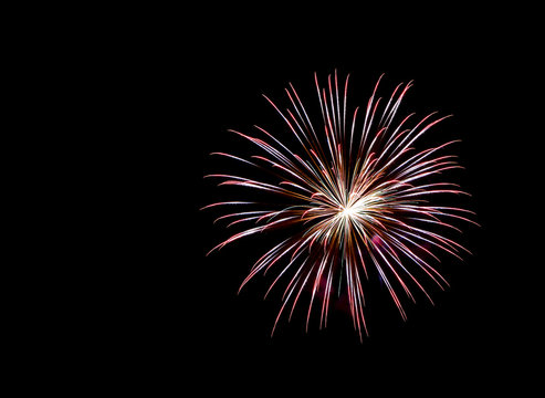 Fireworks , sparklers ,bursting against a black background