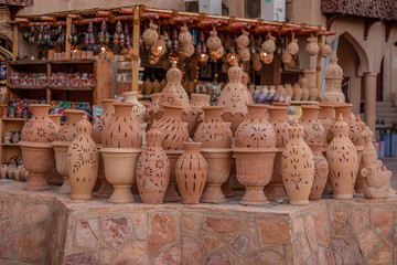Fototapeta na wymiar Ceramic pottery outside Nizwa Souq in the Hajjar Mountains, Oman.