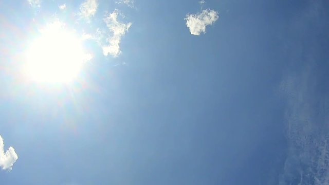 time lapse of Beautiful white clouds ,clouds and sunshine and blue sky  , Video footage .