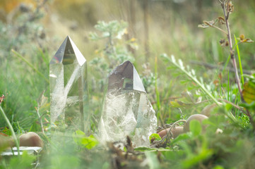 Large clear pure transparent great royal crystals of quartz chalcedony diamond brilliant on nature blurred bokeh autumn background close up