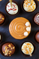Delicious chocolate candies and cakes for dessert