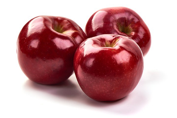 Shiny Red ripe apples, isolated on white background. Fresh raw organic fruits. Close-up