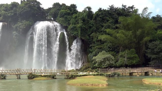 View of the falls from Vietnam during the rainy season when the flow is at its maximum Ban Gioc -Detian Falls  is a collective name for two waterfalls on the Quay Son River