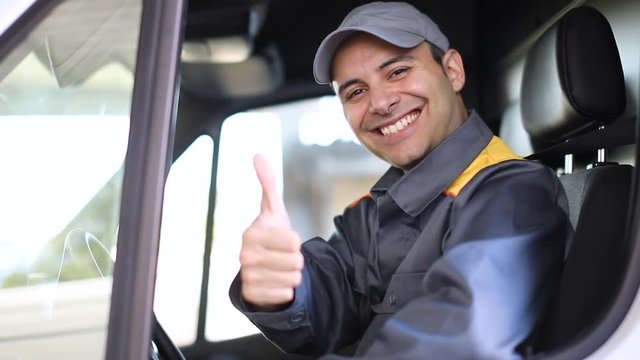 Happy driver showing thumbs up