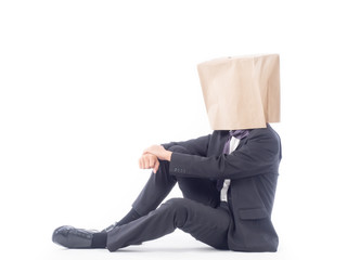 business person concept.blank space paper bag over head businessman in suit and black necktie with white background isolated.