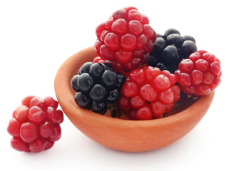 Fresh blackberries in clay bowl