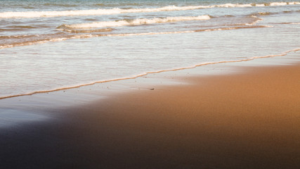 Beautiful soft contrast of light and shadow on a beach