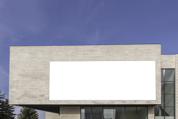 Mock up billboard for advertising or promotion on the wall of the building outdoors