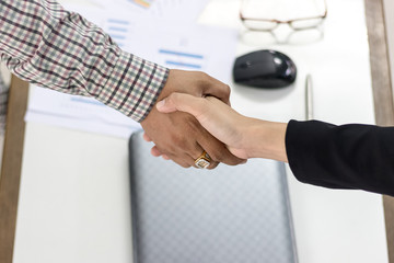 Business man Handshaking Business women, About with working, Happy with success Agreed to work, Handshake Business Marketing in graph Concept.Foreign Investors Success in business together.