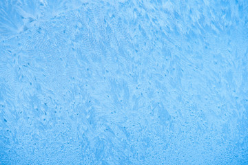frost pattern on window in winter season, close up