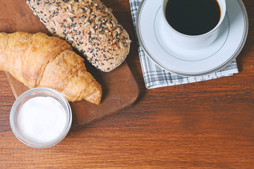 Close up of toast, coffee and cheese cream