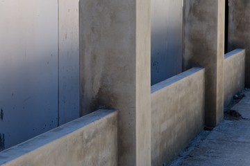 A newly built wall that has been plastered with concrete. Building concept image. 