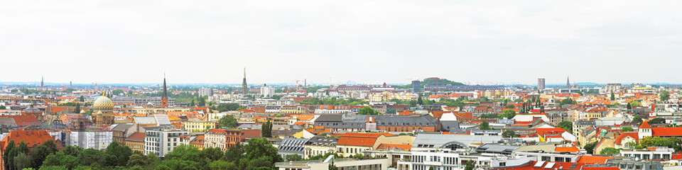Naklejka na ściany i meble Berlin, Germany, panoramic cityscape. Aerial view of central Berlin from the top of Berliner Dom. View of downtown from above. Skyline and scenery the city. New synagogue