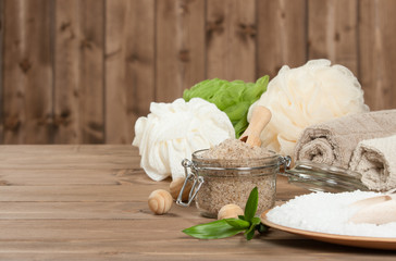 Fototapeta na wymiar Handmade Scrub With Coffee, Lemon And Argan Oil. Dead Sea Bath Salt. Towels, Spa Set.