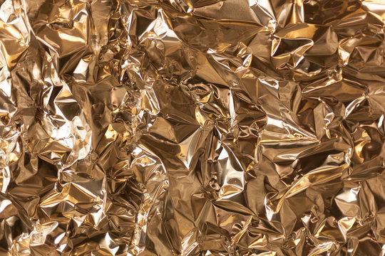 Full frame take of a sheeT of crumpled silver aluminum foil