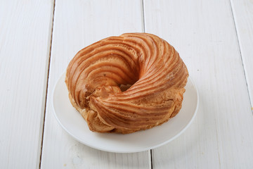 Sweet donut on white wood background. 