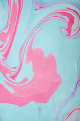 Abstract colored background. Stains of paint on the water. Ebru art, marbled paper.