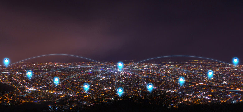 pin flat above night cityscape and glowing networking connection as communication concept - Powered by Adobe