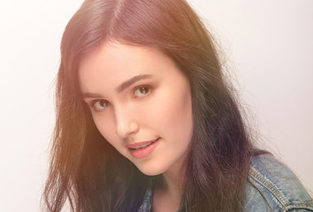 Naklejka premium Portrait of beautiful young woman with black hair