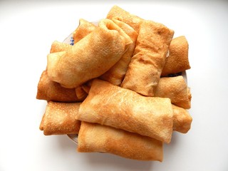 Pancakes with filling inside will decorate the recipe and perfectly complement any culinary site. Homemade pancakes can be with cottage cheese, meat or jam.