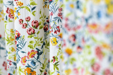 Piece of material in a floral pattern which can be a cloth usually worn during summer.