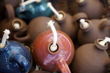 Oil lamps are lighting fixtures that are fueled with oils
