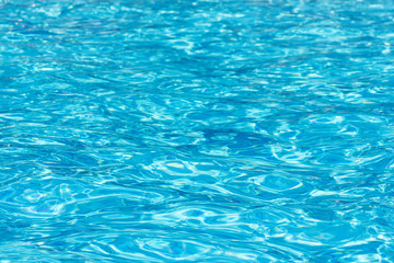 Fototapeta na wymiar Background blue water in the pool