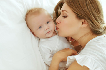 Fototapeta na wymiar Beautiful woman with a baby 