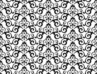 Floral pattern. Vintage wallpaper in the Baroque style. Seamless vector background. White and black ornament for fabric, wallpaper, packaging. Ornate Damask flower ornament