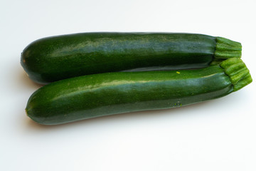 Two courgettes isolated on white