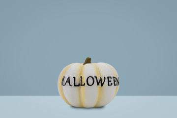 Halloween pumpkin on blue background