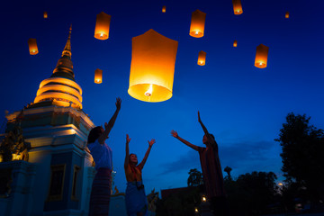 People floating lamp in Yi Peng festival in Chiangmai Thailand