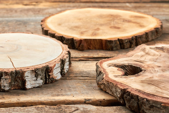 Natural wood slices. Rustic wooden discs. Set of wooden plates. Wooden cake stands.