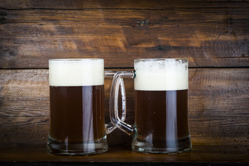 cup of beer on wood