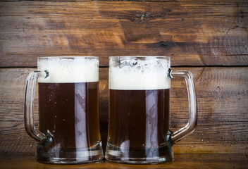 cup of beer on wood