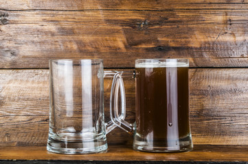 cup of beer on wood