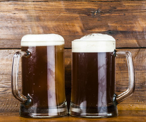 cup of beer on wood