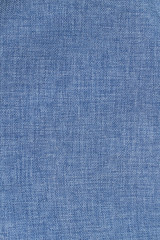 Natural blue cloth background. Dark blue fabric texture. Blue textile material backdrop.