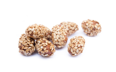 Coated peanuts with sesame isolated on white background
