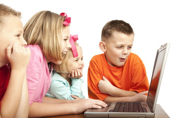 group of children on the computer