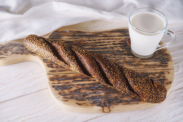 breakfast: glass of milk and loaf