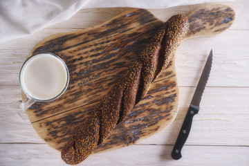 breakfast: glass of milk and loaf