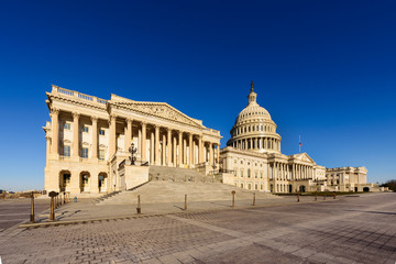 Fototapeta na wymiar Capitol Building East Facade in The Morning with Blue Sky, Washington DC