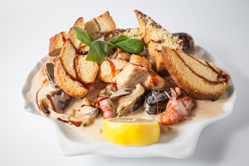 Seafood Chateau with crayfishes, mussels, salmon, crackers, cheese and lemon