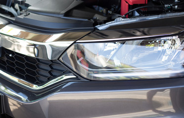 Fototapeta premium Head light of a personal car with LED light