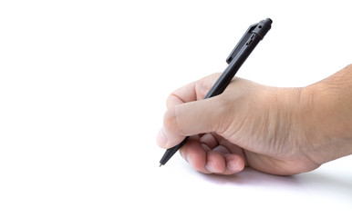 Hand writing on copy space. Male hand holding black pen isolated on white background