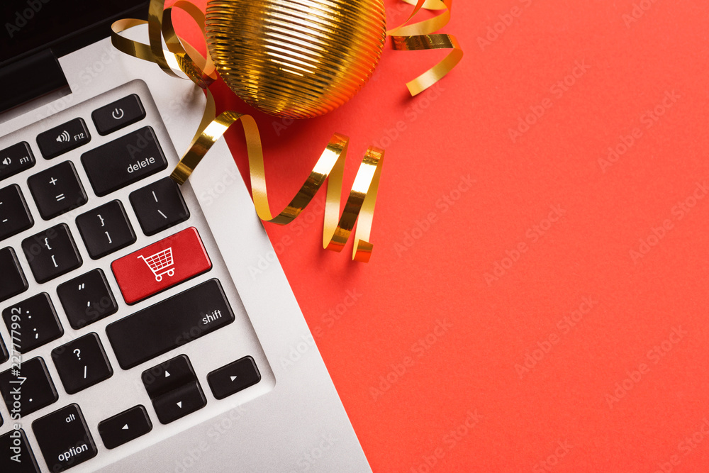 Fototapete computer notebook keyboard with icon shopping cart