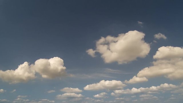 Cumulus clouds on blue sky timelapse