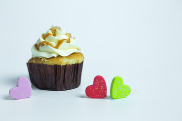 Colorful cupcakes on a white background