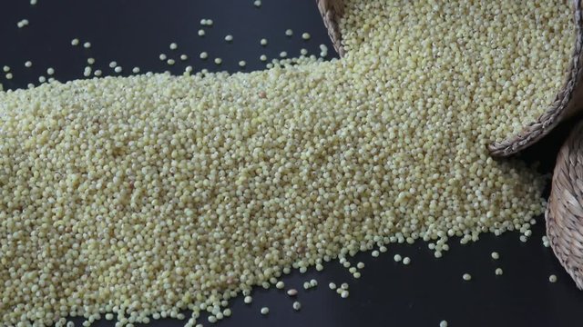 Heap of millet isolated on black background
